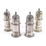 A SET OF FOUR MATCHED LIGHTHOUSE CASTERS. TWO BY JACOB MARGAS, LONDON 1698 AND TWO BY HUTTON
