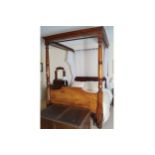 WILLIAM IV PERIOD MAHOGANY FOUR POSTER BED the moulded edged canopy, raised on turned pillars,