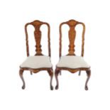 PAIR OF NINETEENTH-CENTURY DUTCH MARQUETRY ARMORIAL SIDE CHAIRS each with a serpentine crest rail,