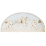 NINETEENTH-CENTURY ITALIAN PLASTER WALL PLAQUE of crescent form, decorated with cherubs 52 x 113