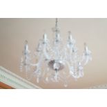 LARGE CRYSTAL CHANDELIER of eight scroll arms 60 cm. high; 80 cm.diameter