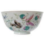 CHINESE FAMILLE ROSE BOWL The exterior decorated with butterflies, the interior with flowers,