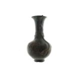 CHINESE QING PERIOD BRONZE VASE with raised leaf decoration 22 cm. high; 13 cm. diameter