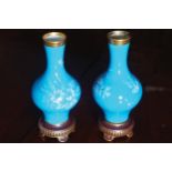 PAIR OF NINETEENTH-CENTURY MINTON PAINTED AND PARCEL GILT VASES 21 cm. high (2)