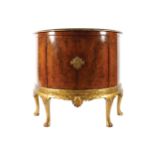 YEW WOOD AND PARCEL GILT SIDE CABINET ON STAND the superstructure with an elliptical shaped top