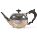 AN EARLY GEORGE I IRISH SILVER TEA POT. MATHEW WALKER, DUBLIN 1717 A spherical plain teapot with