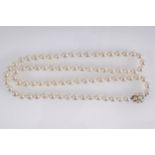 LONG STRAND OF CULTURED PEARLS with pearl flower clasp 60 cm.