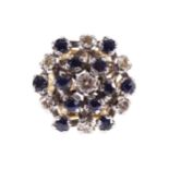 18 CT. MOUNTED CLUSTER RING set with twelve sapphires and seven diamonds
