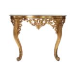 NINETEENTH-CENTURY CARVED GILT WOOD CONSOLE TABLE the veined serpentine white marble top, above a