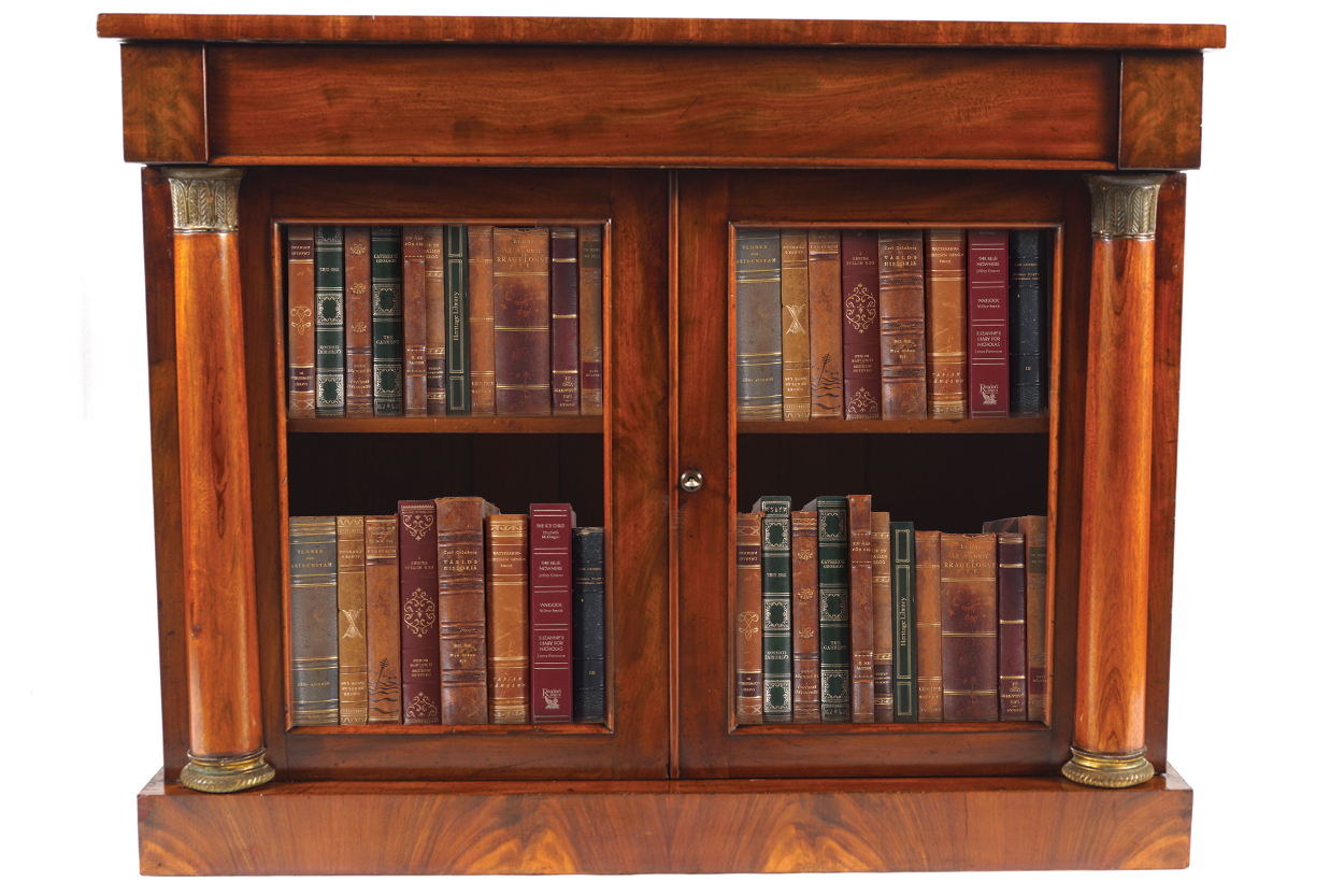 NINETEENTH-CENTURY MAHOGANY BOOKCASE the rectangular top above a conforming frieze over two glazed