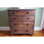 REGENCY PERIOD MAHOGANY CHEST of four drawers furnished with turned knobs, raised on turned legs 106