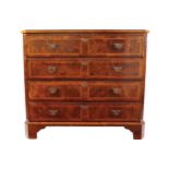EIGHTEENTH-CENTURY WALNUT AND CROSS-BANDED CHEST of two short and three long drawers, furnished with