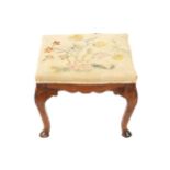 EIGHTEENTH-CENTURY PERIOD WALNUT AND TAPESTRY UPHOLSTERED STOOL, CIRCA 1740 42 cm. high; 54 cm.