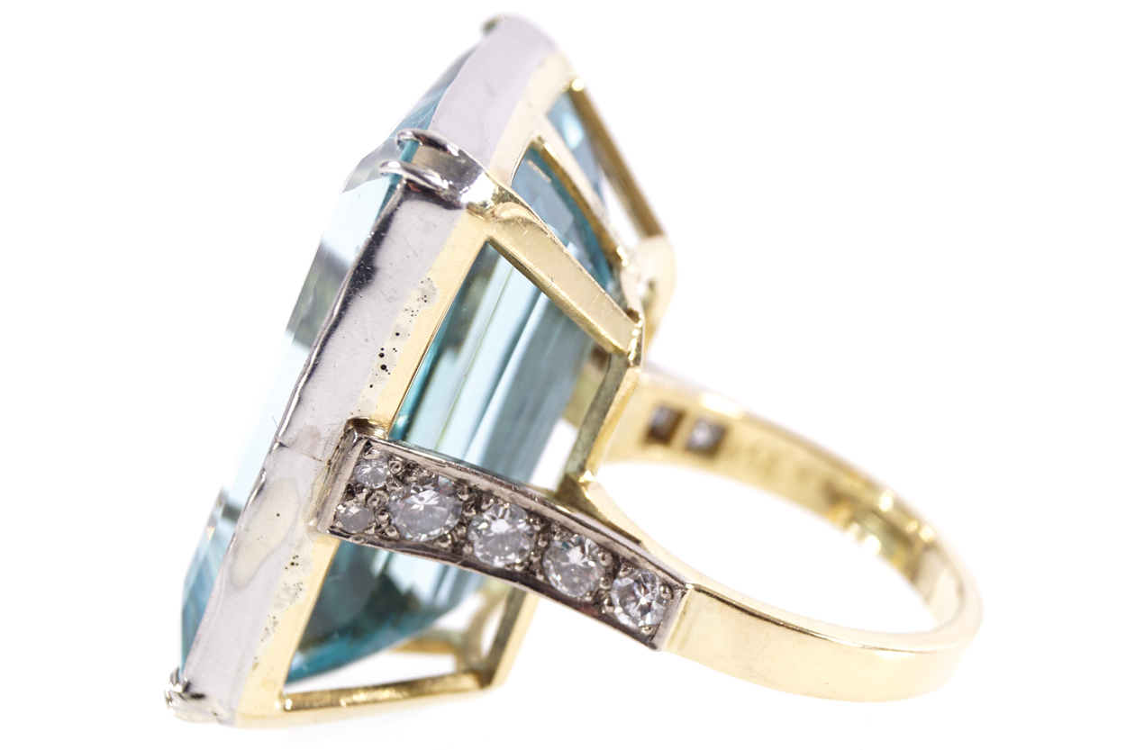 PLATINUM AND 18 CT. GOLD MOUNTED RING set with an emerald cut aquamarine weighing 55 ct. and - Image 2 of 2