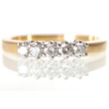 18 CT. GOLD AND DIAMOND FIVE STONE RING