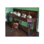 IMPORTANT WILLIAM IV PERIOD MAHOGANY SERVING TABLE the rectangular top with chamfered corners and