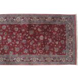 NORTHWEST PERSIAN SILK RUNNERon red ground with all over field and blue border477 x 77 cm.