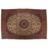 CENTRAL PERSIAN ISFAHAN CARPETon ivory ground with red border223 x 328 cm.