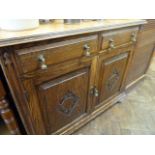 Carved oak small sideboard