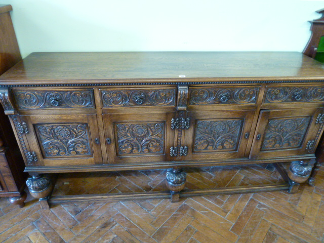 Reproduction carved oak sideboard