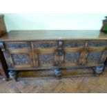 Reproduction carved oak sideboard