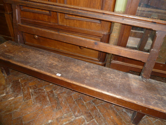 Low Victorian pitch pine open back bench