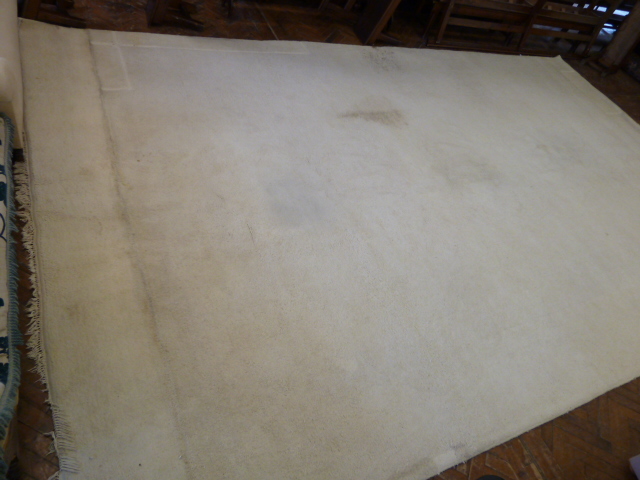 Large cream woollen carpet approx 21' x 12'