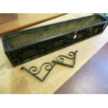 Wrought iron lined window box planter with support brackets
