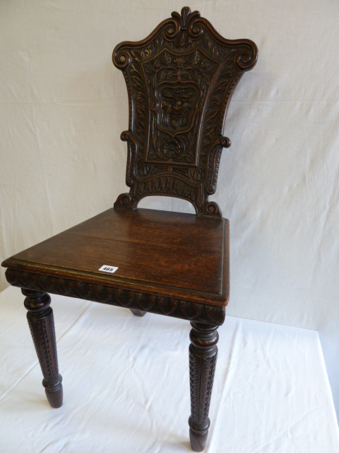 Carved oak Green Man hall chair