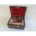 Early Victorian ladies' rosewood fitted travel box containing silver topped jars etc hallmarked