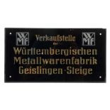 Werbeschild WMF, Geislingen, Mitte 20. Jh., Glas, Silber und Gold auf Schwarz, mit Gold- und