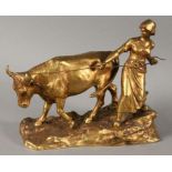 KUHHIRTINVergoldete Bronzeplastik. H.22,5, L.25cmA COW HERDERGilt bronze sculpture, 22.5cm high,
