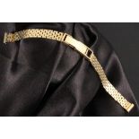 GOLDENES UHREN-ARMBAND 585/000 Gelbgold. L.15,5cm, ca. 15,25g A GOLDEN WRISTWATCH STRAP 585/000