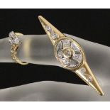 BROSCHE UND RING 585/000 Gelb- und Weissgold mit weissen Safiren oder Kristallen. Ringgr. 17,5mm,