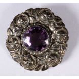 ART DECO BROSCHE 1930er Jahre Silber 800. Rosenrelief mit mittigem Amethyst. Gest. D.3,7cm, ca. 14,