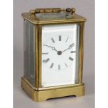 REISEUHR um 1900 Allseitig verglastes Messinggehäuse. Schlüsselaufzug mit sichtbarer Unruhe. H.