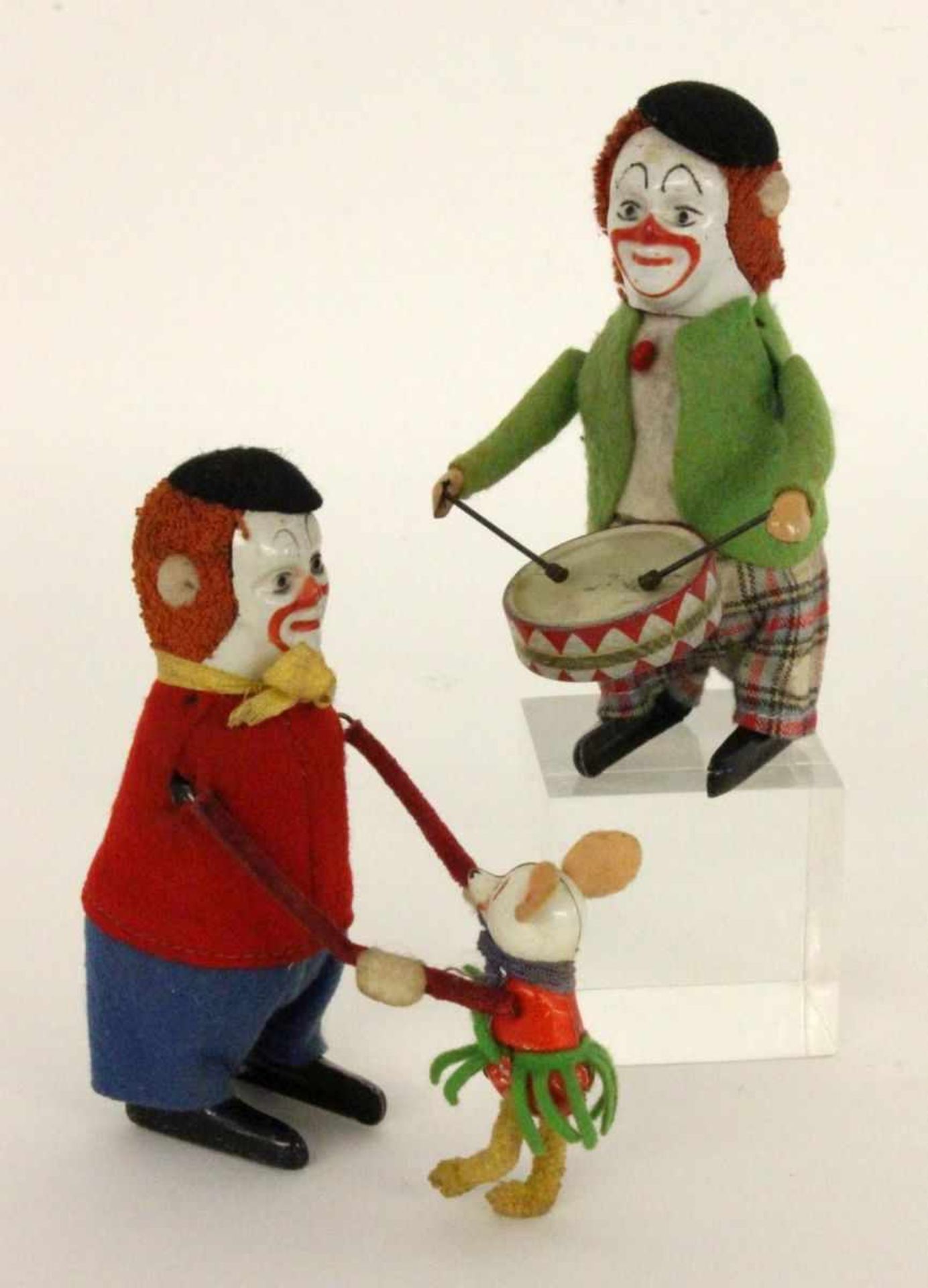 ZWEI SCHUCO TANZCLOWNS Schuco Patent Made in Germany Clown mit Affe und Clown mit Trommel.