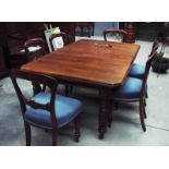 Windout mahogany extending table by Mathew Rose & Son, Hackney, N E London, with three winders,