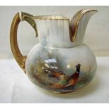 A Royal Worcester porcelain jug of squat globular form with curved spout and semi circular open top,