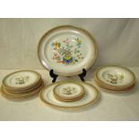 A Royal Worcester part dinner service, hand painted with enamels with Chinese floral pattern