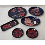 A group of six modern Moorcroft Anemone pattern comprising cake plate, shallow dish, pair of