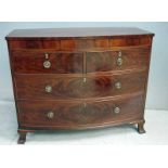 A 19th century mahogany bow fronted chest of drawers with three satinwood lined frieze drawers above