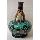 An Arts & Crafts pottery vase of compressed footed form with kiln shape neck, decorated with six