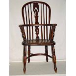 A Windsor armchair, arm with pierced splat and crinoline stretcher