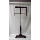 A fine early 19th century Gillows mahogany and brass music stand, adjustable easel on brass pole