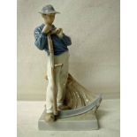 A Royal Copenhagen figure of a Farmworker with Scythe and Wheatsheaf, number 685, 25.5cm high