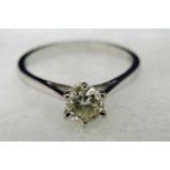 An 18ct white gold, diamond solitaire ring, the brilliant cut stone approx 0.5carat, in six claw