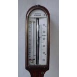 A George III oak stick barometer by C Borelli, of typical arch top form, ivory scale behind brass