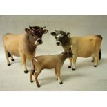 A Beswick three-piece cattle group, Jersey Family, Bull 1422, Cow 1345 and Calf 1249D