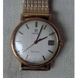 A 1970's Omega gentleman's wristwatch, silvered satin effect dial with baton markers, date